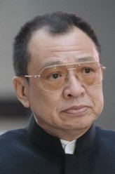 覃欢喜（许绍雄饰演）