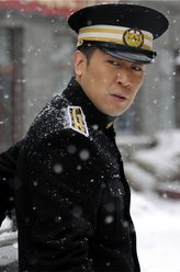 年定邦（于和伟饰演）