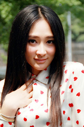 区淑娴（张玉洁饰演）