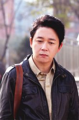 文辉（潘粤明饰演）