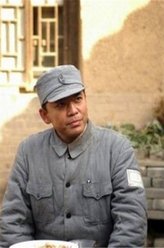 赵刚（何政军饰演）