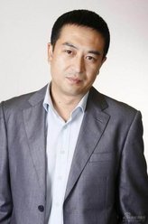 宋思明（张嘉译饰演）