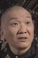 江天助（李耕饰演）