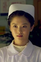 熊明夏（王純饰演）