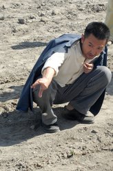 王万春（刘向京饰演）