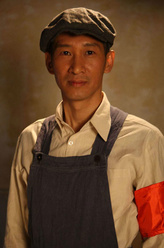 邢子玉（王劲松饰演）