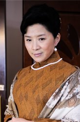 梅玉（迟蓬饰演）