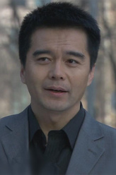 梁冰（许亚军饰演）