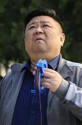 富伯恒（梁冠华饰演）