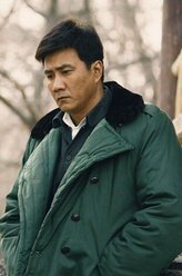 马东（胡军饰演）