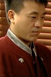 吴德利（何冰饰演）