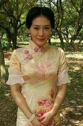 李念珍（张译木饰演）