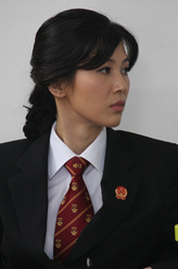 庄亚明（童蕾饰演）