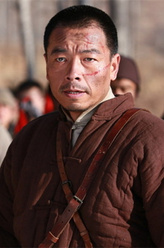 武忠义（王挺饰演）