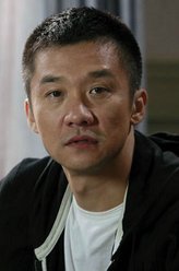 李国强（黄志忠饰演）