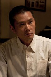 老丁（任帅饰演）