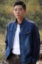 谷天明（林继东饰演）