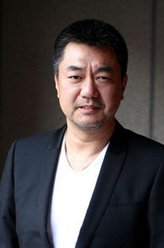 葛志强（董勇饰演）