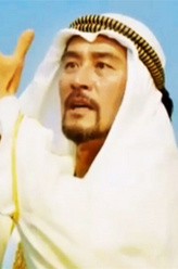 张达九（崔民秀饰演）