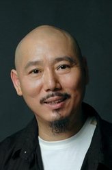 乔守财（李成儒饰演）