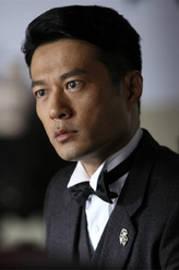 梁文权（谭凯饰演）