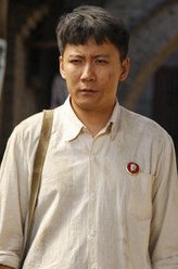 梁长安（赵峥饰演）