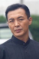 袁善民（王强饰演）